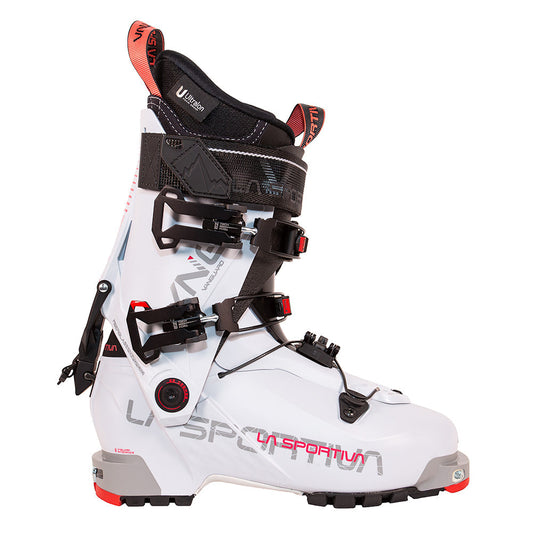 The La Sportiva Vanguard Women's ski boot features a white design with black buckles, red and black accents, a ski/walk mode lever, high cuff, and rugged sole—ideal for backcountry or powder skiing adventures.