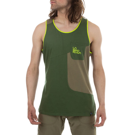 A man wears the La Sportiva Dude Tank M (2023), a green and olive loose-fitting tank with front pocket and logo, made of lightweight jersey, paired with light brown shorts, standing against a white background.
