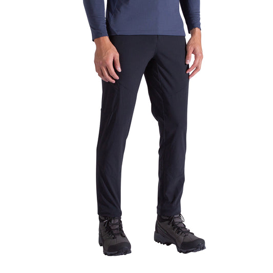 A person in La Sportiva West Crest Pants Men's (black), a navy long-sleeved shirt, and black hiking boots stands against a white background with their face hidden.