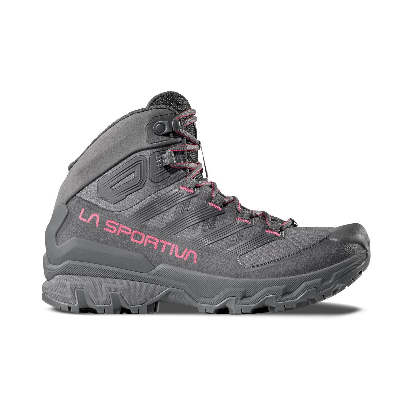 The La Sportiva Ultra Raptor 3 Mid GTX Women's hiking boot is gray with pink accents and "La Sportiva" in pink on the side. It features rugged tread, ankle support, waterproof protection, and is shown in left profile on a white background.