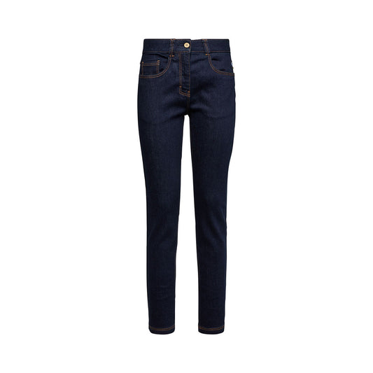 The La Sportiva Eldo Jeans 2.0 Women's are dark blue, slim-fit stretchy jeans with orange stitching, a button closure, and five pockets, shown against a white background.