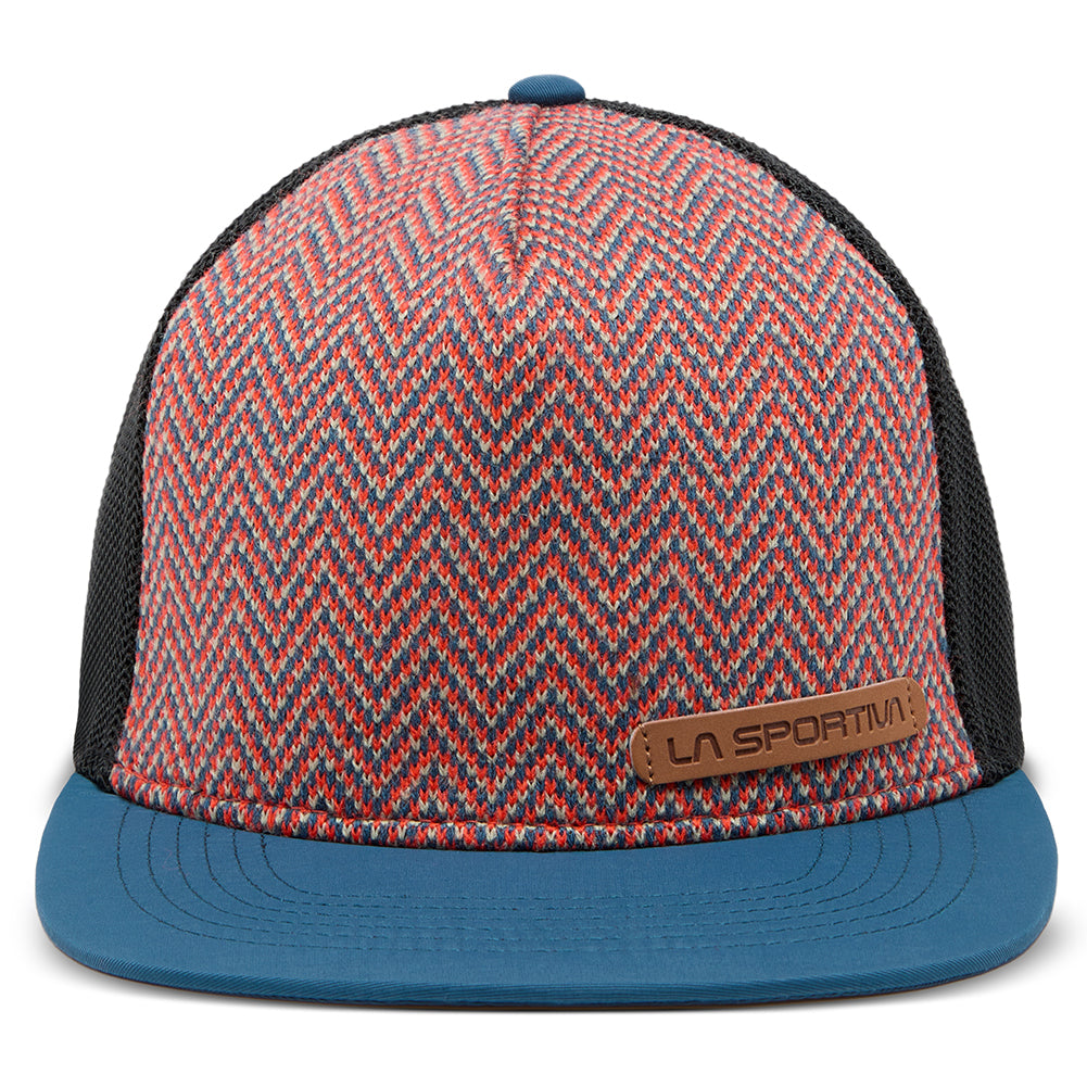 The La Sportiva Moose Trucker Hat features a blue flat brim, black mesh sides, a red, gray, and blue chevron-knit front panel, and a brown La Sportiva logo patch on the front left side.