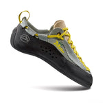 A gray and black La Sportiva Mythos ECO Women's climbing shoe with yellow laces, yellow stitching, a rugged rubber sole, and the Mythos logo on the side, shown against a white background. Eco-friendly design.