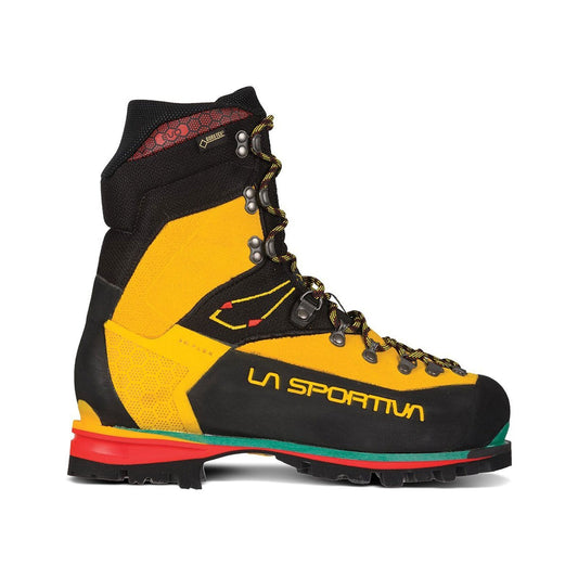 The La Sportiva Nepal EVO GTX is a yellow and black mountaineering boot with red, green, and black soles, metal eyelets, yellow-striped laces, Gore-Tex lining, and the La Sportiva logo in yellow—ideal for ice climbing adventures.