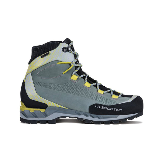 The Trango Tech Leather GTX Women's by La Sportiva is a grey and yellow waterproof mountaineering boot with a black sole and light blue laces, shown in profile view; crampon compatible for reliable alpine performance.
