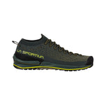 The La Sportiva TX2 EVO is a lightweight, dark green and black approach shoe with yellow accents, a sticky rubber textured sole, low-cut lace-up design, and the La Sportiva logo on the side.
