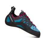 The La Sportiva Tarantulace Women's climbing shoe features a blue and black design with maroon laces, a curved snug fit, and a durable rubber sole for rock climbing.