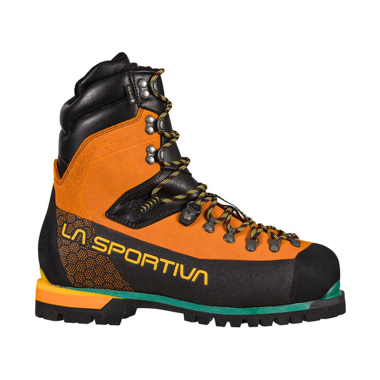 The La Sportiva Nepal S3 Work GTX is an orange and black mountain boot with yellow laces, sturdy sole, and reinforced toe and ankle areas, designed for outdoor use and meeting the demands of an arborist boot.