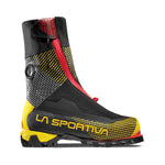 The La Sportiva G-Summit is a high-altitude mountaineering boot in black, yellow, and red, featuring double boot construction with a removable liner, protective gaiter, side zipper, rugged sole, and La Sportiva branding.