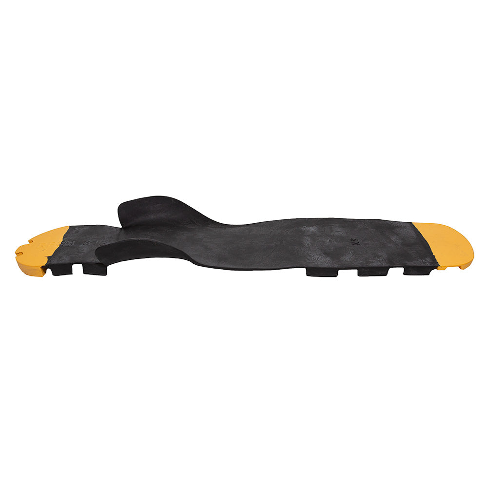 Black rubber road speed bump with yellow end caps, viewed from the side, shows its contoured surface and raised sections, similar in design to a La Sportiva Outsole RPS3.