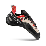 The La Sportiva Genius climbing shoe is shown with a beige and black upper, red accents, No-Edge technology for precision, a black rubber toe, and La Sportiva logos on the heel and side.