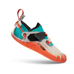 The La Sportiva Gripit is a kids' climbing shoe with an orange sole, light gray Eco leather upper, teal accents, red laces, a red heel pull loop, velcro strap, and side branding.