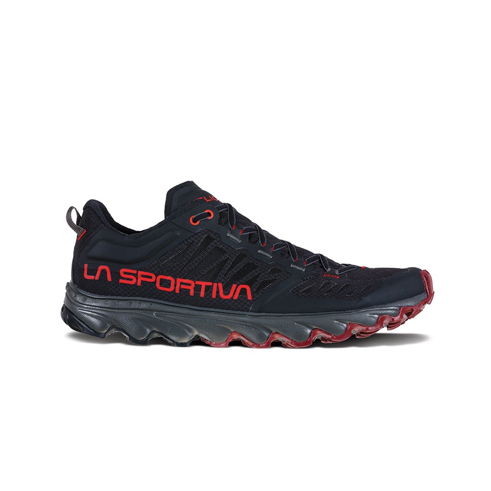 The La Sportiva Helios III is a black and red cushioned trail shoe featuring bold red LA SPORTIVA branding and a rugged, abrasion-resistant sole for excellent traction.