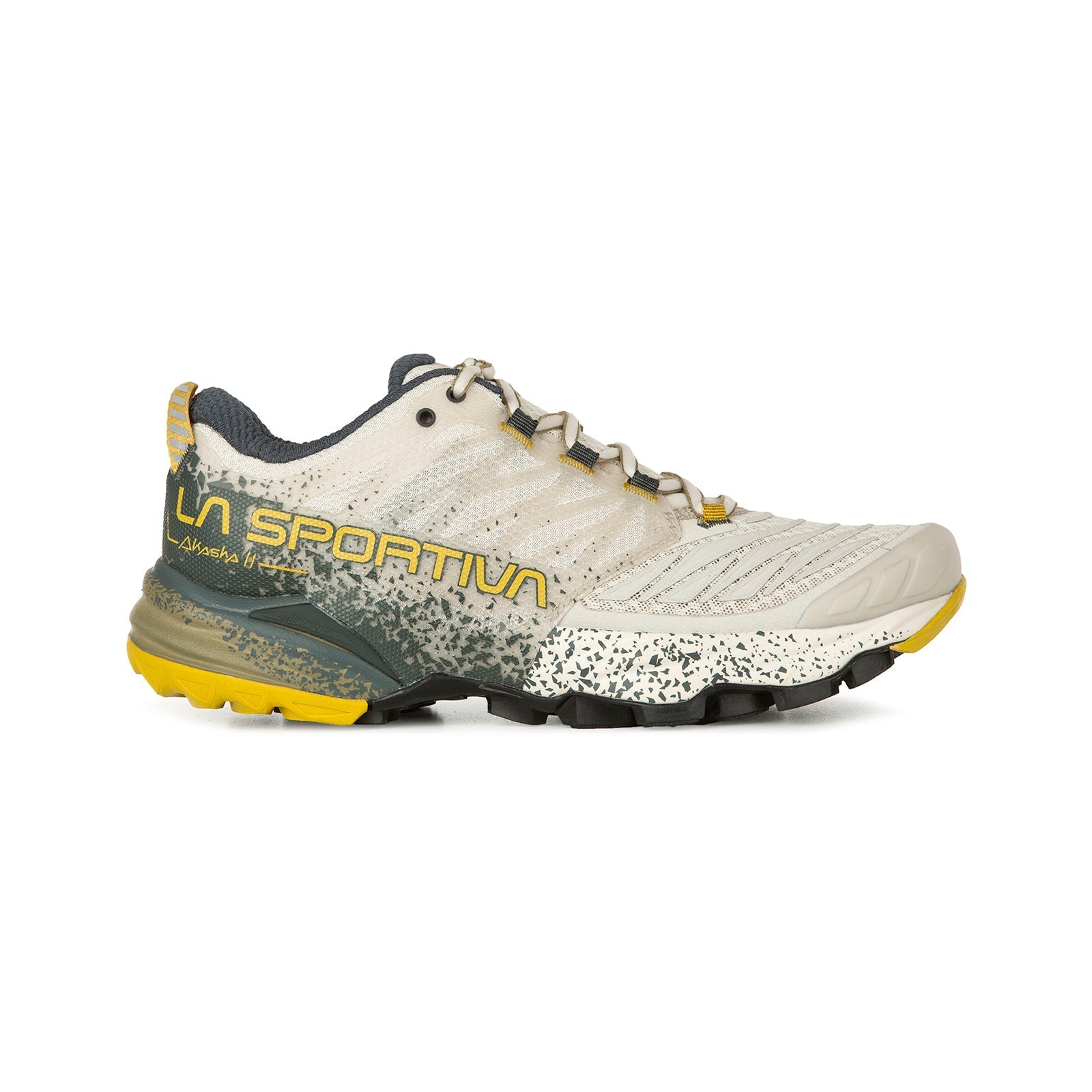 The La Sportiva Akasha II Women's is a beige and yellow trail running shoe with black and green accents, logo detailing on the side, and a rugged, multi-textured sole for traction on technical terrain during high-mileage runs.
