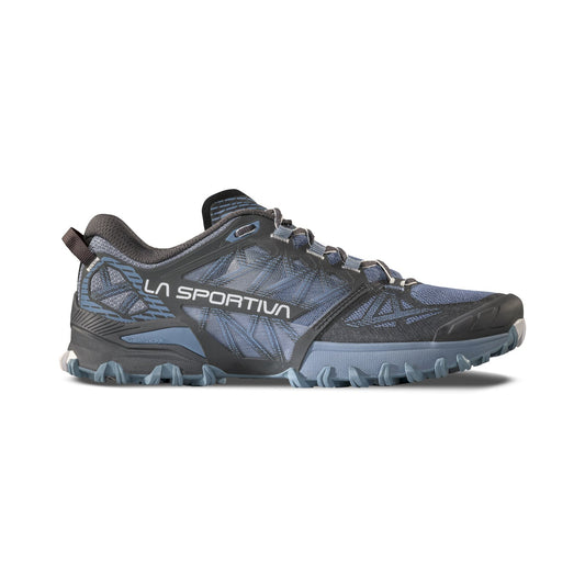 The La Sportiva Bushido III Women's is a blue and black mountain running shoe with a rugged, textured sole and geometric side patterns, designed for trail running and shown in side profile.