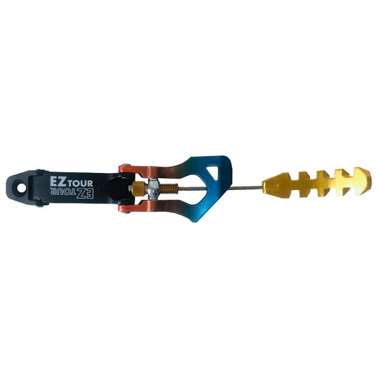 The Cuff Buckle Synchro/Shadow N.3 (Pair) from La Sportiva pairs well with EZ Tour ski binding toe pieces featuring blue and orange metal parts and a gold, shovel-shaped locking mechanism for reliable performance.