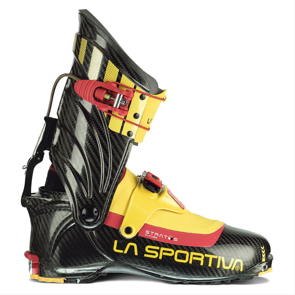 The Stratos Hi-Cube Boots by La Sportiva are lightweight, high-tech ski mountaineering race boots in black, yellow, and red with carbon fiber details, buckles, and rear support—ideal for mountain or alpine use.