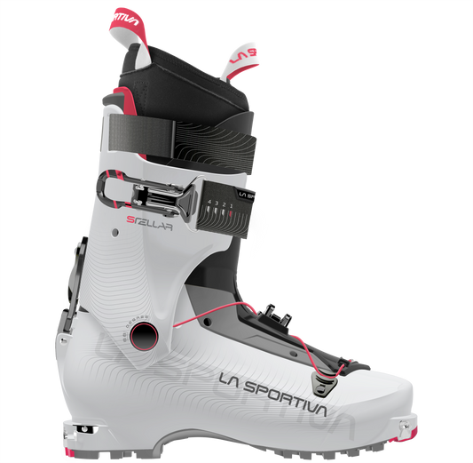 The La Sportiva Stellar is a white lightweight ski boot with black and red accents, strap, buckle, and cables for secure fit—ideal for backcountry touring—displayed in a side profile on a plain background.