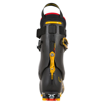 The La Sportiva Skorpius CR touring boot in black features yellow and red accents, a prominent yellow locking mechanism, branded top strap, and is built for comfort on long backcountry skiing ascents.