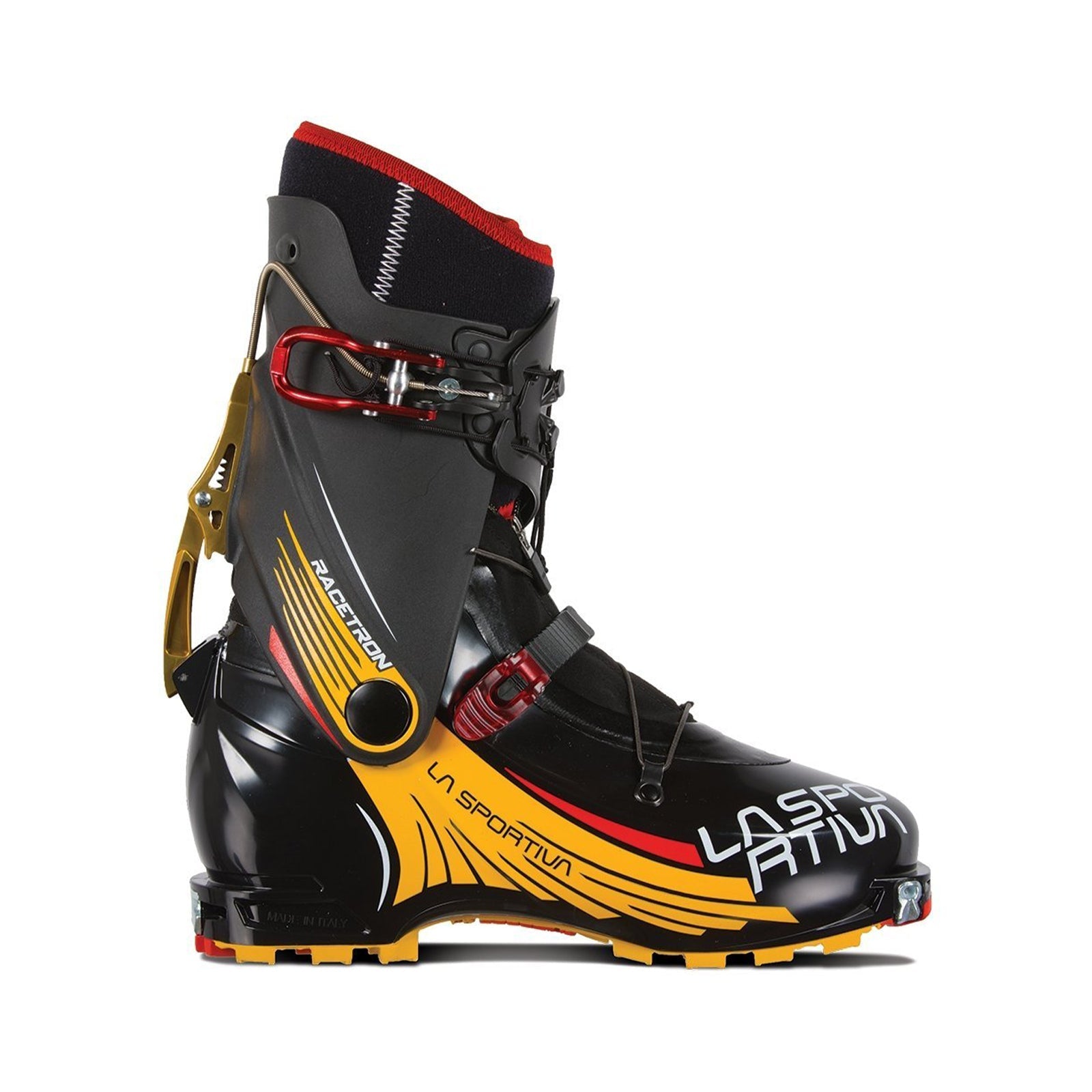 The La Sportiva Racetron is a black and yellow ski mountaineering boot with red and orange accents, buckles, visible fastenings, a high ankle cuff, and the La Sportiva logo on the side.