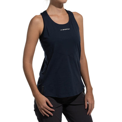 A person wearing a black La Sportiva Twist Tank Women's (2025) and black pants stands against a white background with their arms relaxed by their sides.