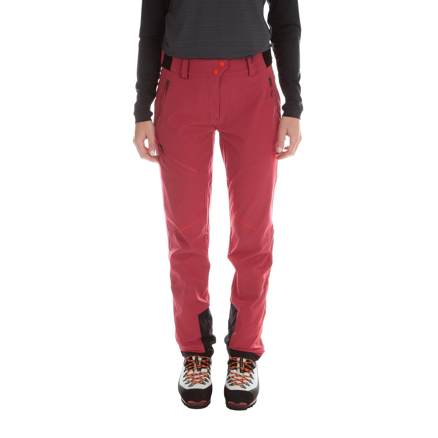 A person is shown from the shoulders down wearing La Sportiva Excelsior Pants Women's in red, a black long-sleeve top, and hiking boots with red and black laces—ideal attire for mountaineering or ski-touring adventures.