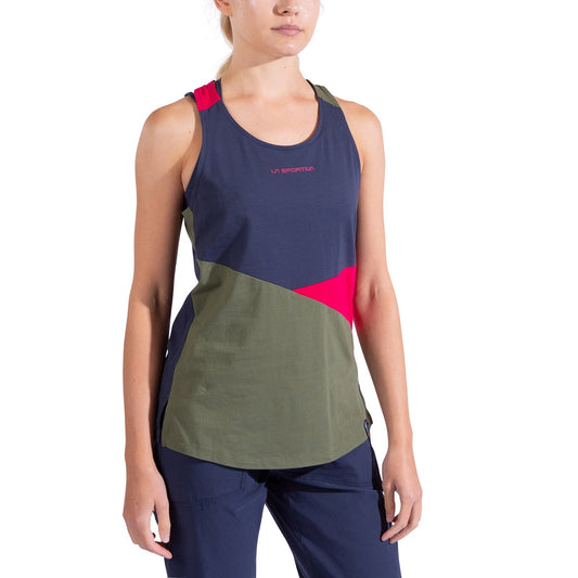 A woman wears the La Sportiva Twist Tank Women's, a sleeveless color-block climbing top in navy, olive, and red—made from organic cotton with La Sportiva branding—paired with navy active pants. Plain white background.