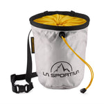 The La Sportiva Granite Chalk Bag is a cylindrical silver and yellow climbing bag featuring a black closure cord, black waist strap, and the La Sportiva logo on the front.