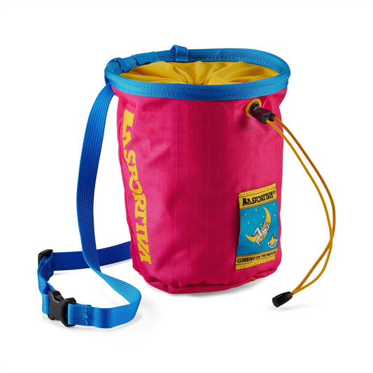 The La Sportiva Granite Chalk Bag COTM is pink with blue and yellow accents, a blue belt, yellow drawstring closure, and a front patch featuring a climbing graphic.
