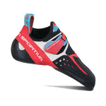 The La Sportiva Solution Comp Women's climbing shoe in red, white, and black with blue accents features a Velcro strap and downturned toe, offering precision, grip, and superior heel-toe camming for rock climbing.