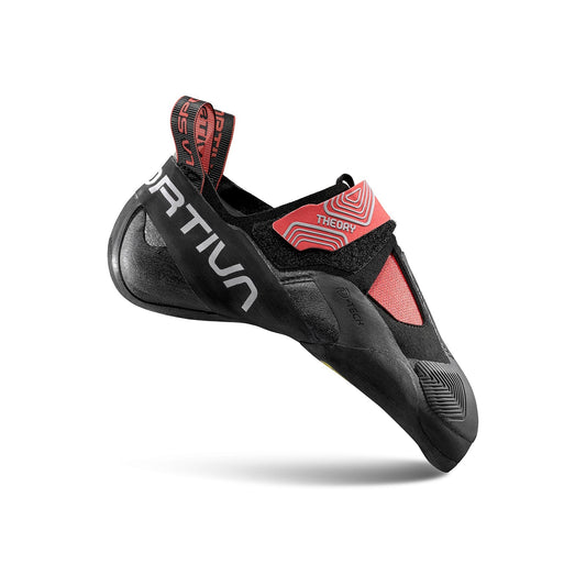 The La Sportiva Theory Women's climbing shoe, black and red with a Velcro strap and aggressive downturned shape, features No-Edge technology and has the brand name on the side. Photographed on a white background.