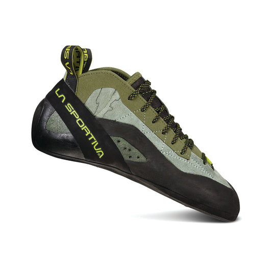 The La Sportiva TC Pro climbing shoe, shown on a white background, features green and black colors, yellow branding, a lace-up design, and a durable rubber sole.