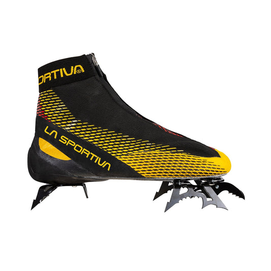 The La Sportiva Mega Ice EVO is a black and yellow mountaineering boot with a zippered cover, attached metal crampons, and the La Sportiva logo—ideal ice climbing footwear for tough alpine conditions.