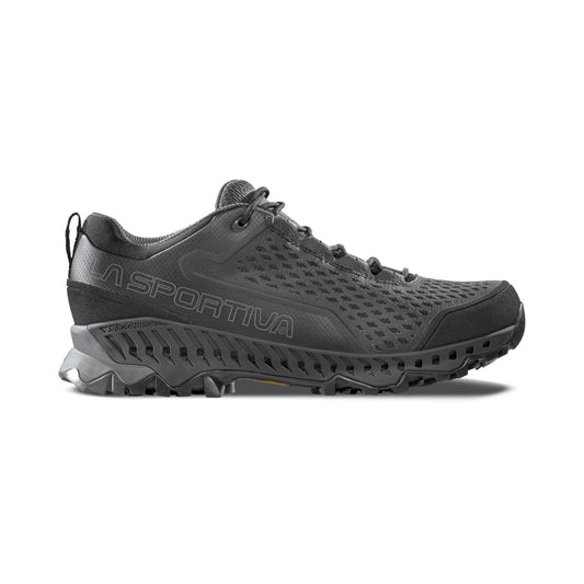 The La Sportiva Spire GTX in black is a trail running shoe with a rugged textured sole, breathable mesh upper, and subtle heel branding. Gore-Tex Surround technology makes it an ideal waterproof hiker.