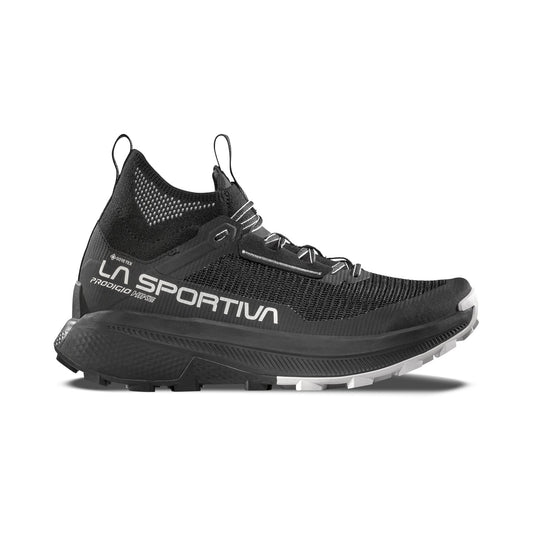 The La Sportiva Prodigio Hike GTX is a black trail running shoe with white accents, mesh upper, bold LA SPORTIVA branding, durable sole, and heel pull tab—built for rugged mountain hiking and outdoor performance.