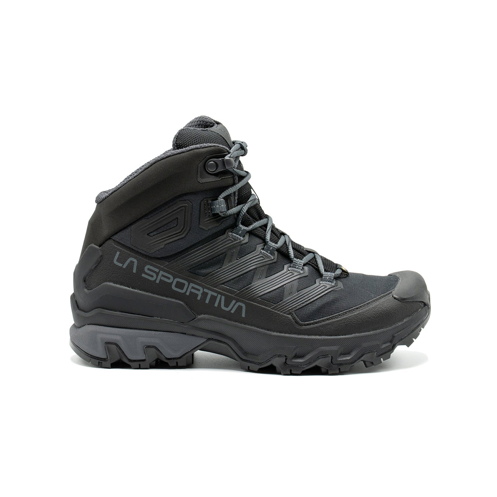 The La Sportiva Ultra Raptor 3 Mid GTX is a black waterproof hiking boot featuring rugged tread, mid-ankle support, and detailed lacing, shown in a left side profile on a white background.