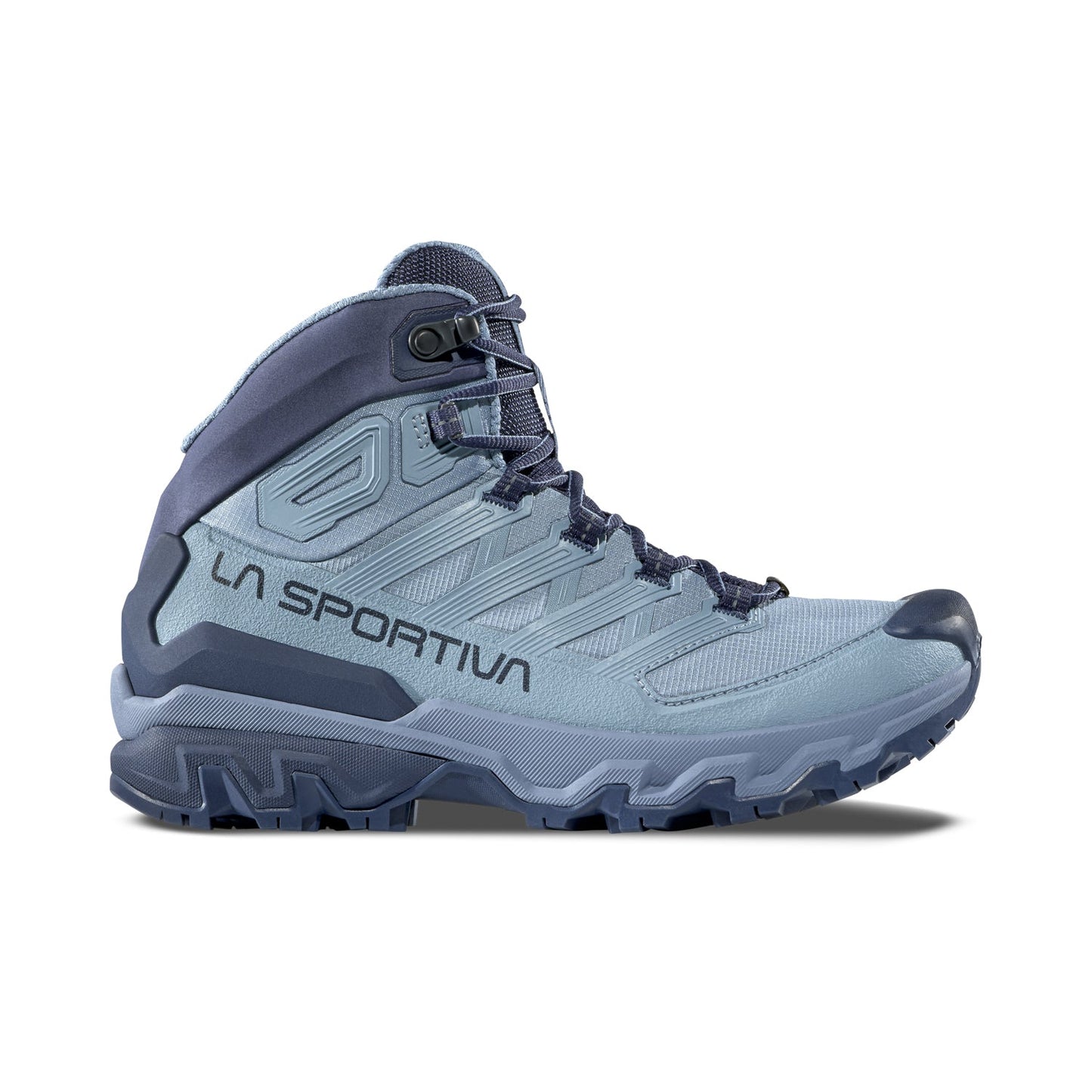 The La Sportiva Ultra Raptor 3 Mid GTX Women's waterproof hiking boot features light blue and navy colors, black laces, and rugged tread, shown from the side on a white background.