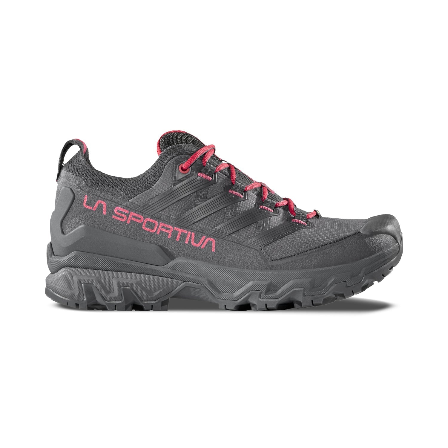 The La Sportiva Ultra Raptor 3 GTX Women's hiking shoe is gray with pink accents, including the brand name and laces. It features Gore-Tex technology and is displayed on a white background.