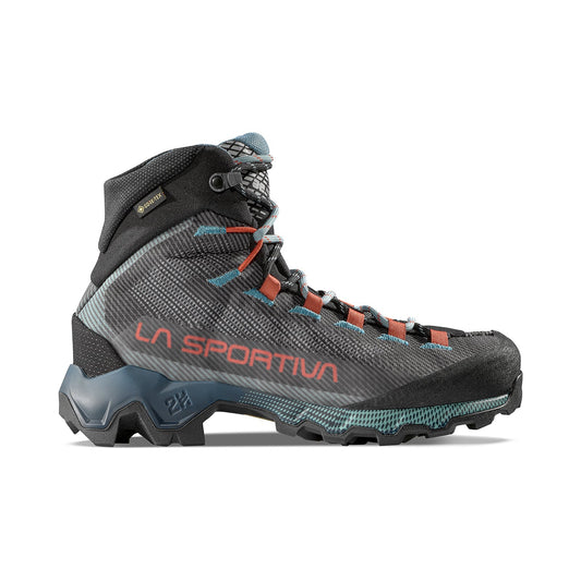 A single La Sportiva Aequilibrium Hike GTX Women's mid-cut boot in black, blue, and red is shown from the side on a white background. It features a rugged sole, high ankle support, and prominent branding for mixed-terrain hiking.