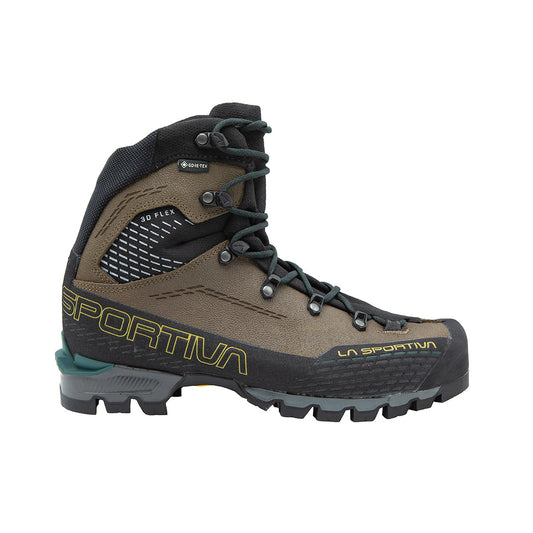 The La Sportiva Trango Alpine GTX hiking boot features brown and black colors, rugged soles, high ankle support, black laces, and yellow La Sportiva branding. Built for outdoor adventures on rough terrain and alpine peaks.
