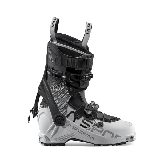 The La Sportiva Kilo XTR Women's ski touring boot, in silver and black, offers adjustable buckles and straps, a robust sole, high ankle support, and delivers top lightweight downhill performance.