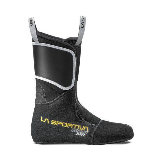 The La Sportiva Kilo XTR Liner Women's is a black liner for ski mountaineering boots with high ankles, two pull loops, yellow and white logos, a reinforced front panel, and overlapping closure—ideal as a replacement liner.