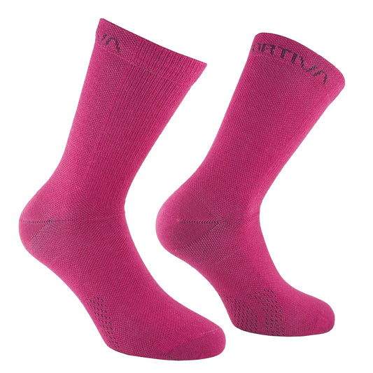 A pair of La Sportiva Merino Hiking Socks in bright pink, featuring a textured pattern and subtle brand lettering near the crew-length top cuffs, displayed on a white background.