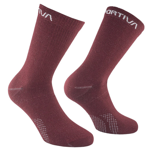 A pair of La Sportiva Merino Hiking Socks in maroon, featuring white text near the cuffs and white stitching on the toes and heels, displayed on a white background.