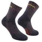 La Sportiva Swift Trail Socks: black crew-length athletic socks with subtle red and orange accents and yellow text near the top, engineered for trail durability, speed, and agility. Displayed on a white background.