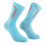 The La Sportiva Flow Trail Socks are light blue with red diagonal stripes and side text, made from quick-drying fabric for mountain running, shown against a white background.