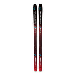 A pair of La Sportiva Gara Aero LS Women's race skis in red and black with blue and white accents stand upright side by side against a white background—designed for lightweight competitions and excellent uphill performance.