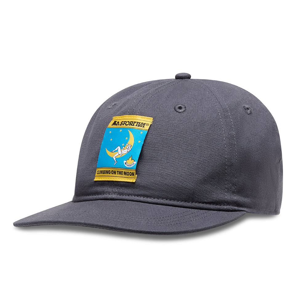The La Sportiva Climbing On The Moon Hat (2025) is a dark gray organic cotton cap with a yellow and blue astronaut-moon patch and "LA SPORTIVA" & "COMING ON THE MOON" text—ideal for dreamers who love climbing.