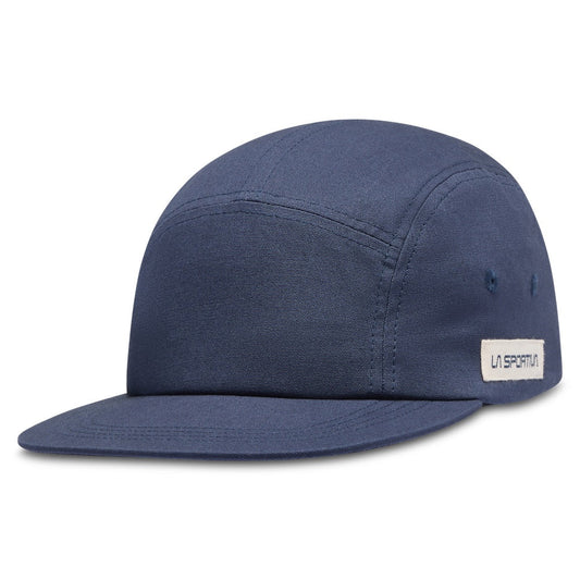 The La Sportiva Mountain Logo Hat (2025) is a blue five-panel hat made from organic cotton, featuring a slightly curved brim and a small white rectangular logo tag—ideal for outdoor adventures.