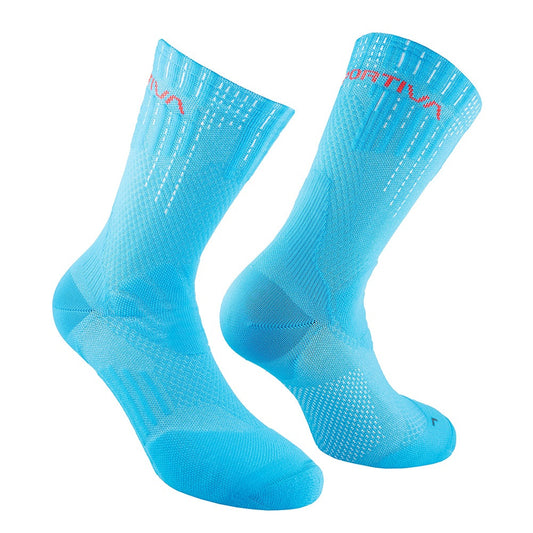The La Sportiva Endurance Trail Socks are bright blue with a subtle pattern and red text near the top. Designed for comfort and durability, they’re displayed side by side, showcasing their length and texture—ideal for rugged trails.